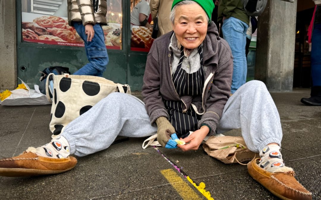 I take old flowers and put them in the sidewalk cracks to make it prettier