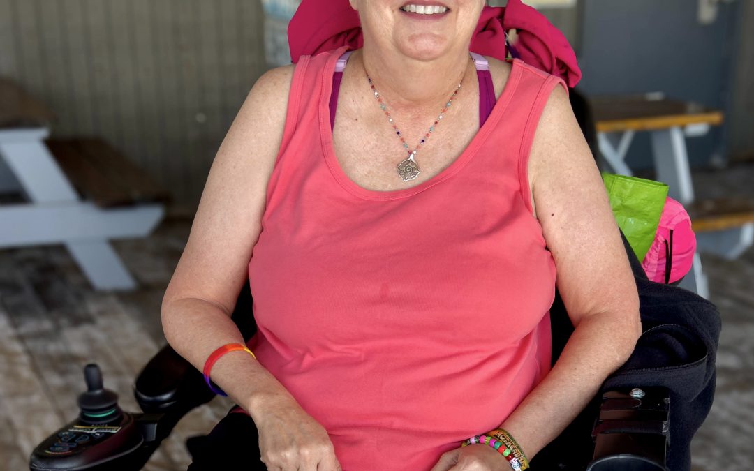 This wheelchair raises and lowers so I can be at eye level–not looked down on. It levels the playing field.